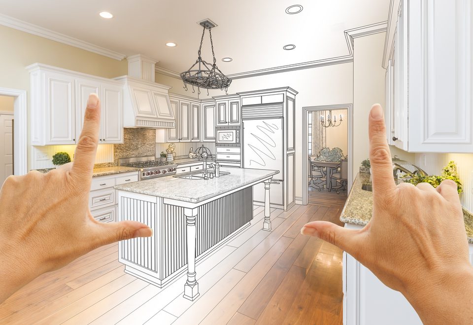 Female Hands Framing Gradated Custom Kitchen Design Drawing and Photo Combination